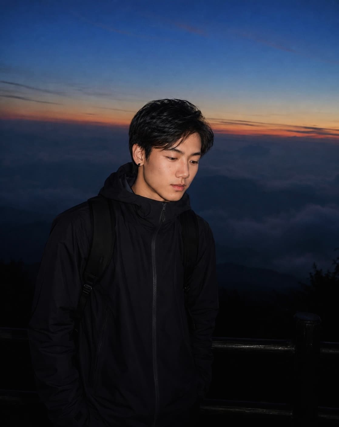 Portrait at sunset above the clouds