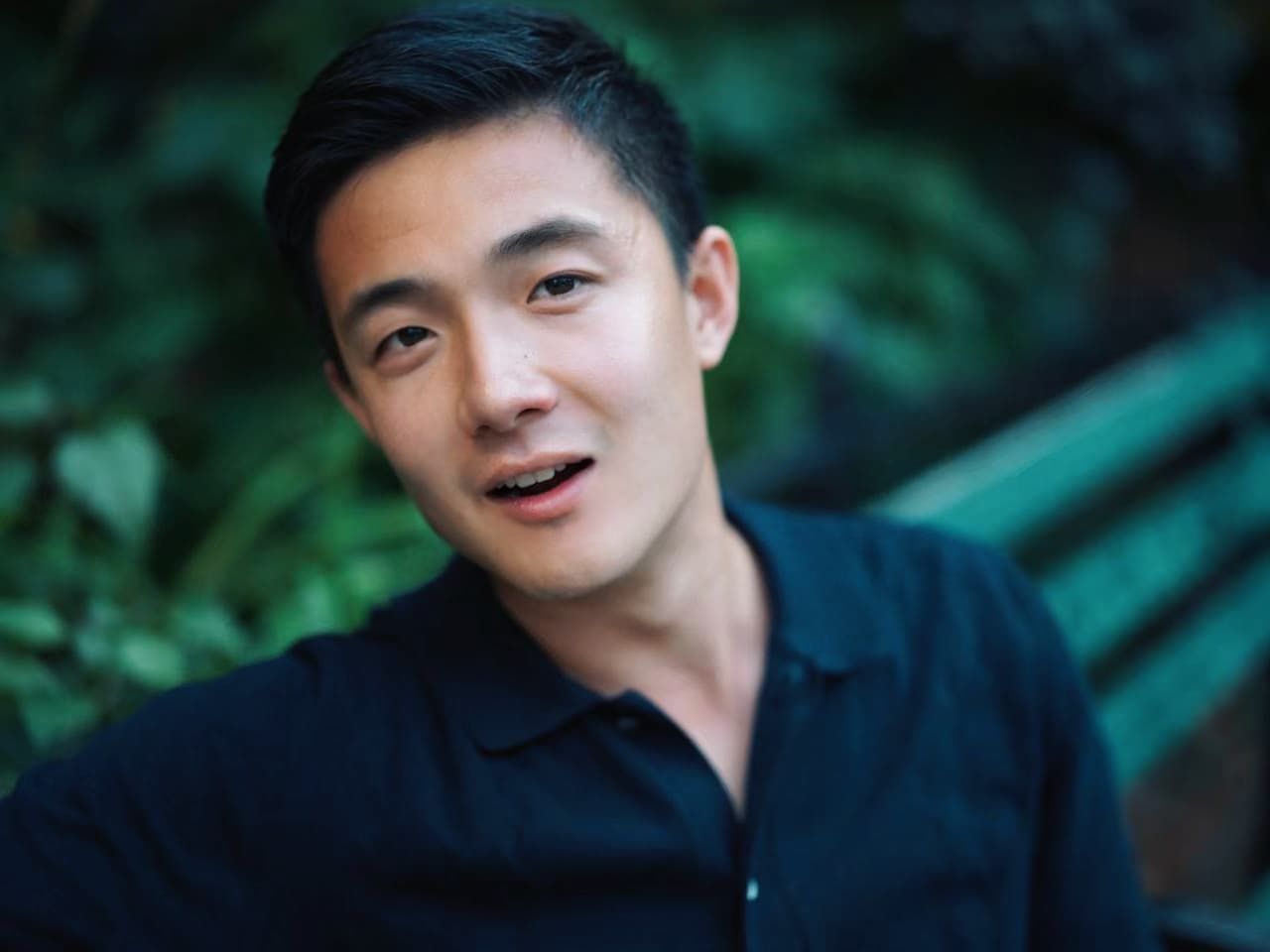 Portrait surrounded by greenery